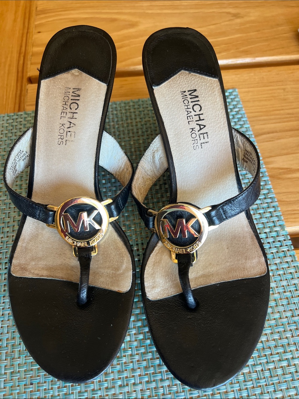 Michael Kors Black Leather Logo Thong Sandals with Gold MK Emblem